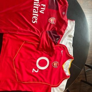 Two Large Arsenal soccer jerseys, $25 total for both of individual buy $15.